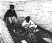 Skiff with a single cylinder antique inboard. Similar to those in motor canoes, dories, and motor launches.